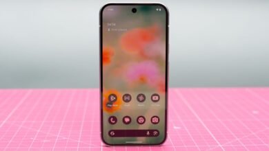 Google Pixel 9 in green Wintergreen color showing AI features on screen