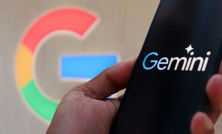 Google Gemini AI logo on a smartphone with Google background