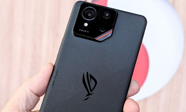 Asus ROG Phone 9 front and back and sides view with Snapdragon logo behind