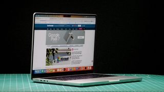 best MacBook and Macs MacBook Pro 14-inch (2023) in a studio with screen showing website